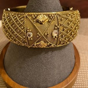 Ornate gold tone and crystal wide hinged cuff bracelet